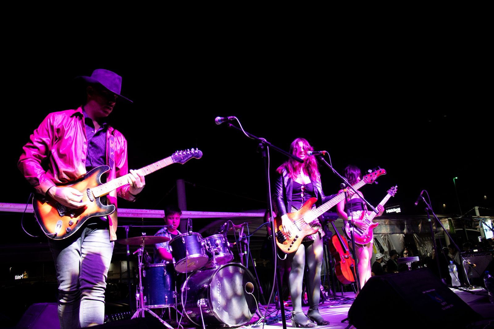Kids Monsters performing live at night